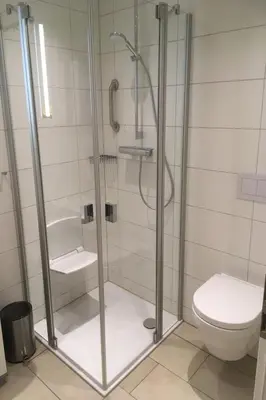 Ein Badezimmer in der Unterkunft Haus Strandläufer Apartment 3 6 Watt'n Blick