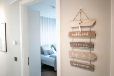 Ein Bett oder Betten in einem Zimmer der Unterkunft Haus Strandläufer Apartment 3 1 Strandhaus 3 1