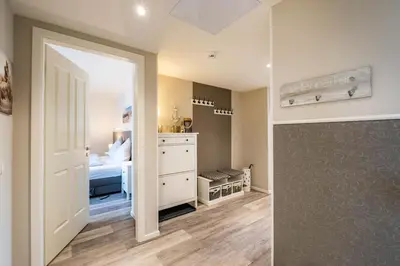 Ein Bett oder Betten in einem Zimmer der Unterkunft Haus Strandläufer Apartment 0 7 See-Hund
