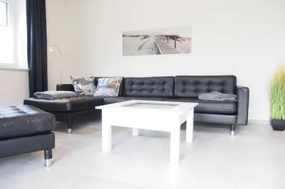 Ein Sitzbereich in der Unterkunft Haus Strandläufer Apartment 0 1 Strandburg