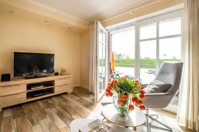 TV/Unterhaltungsangebot in der Unterkunft Haus Hafenresidenz Apartment 1 3