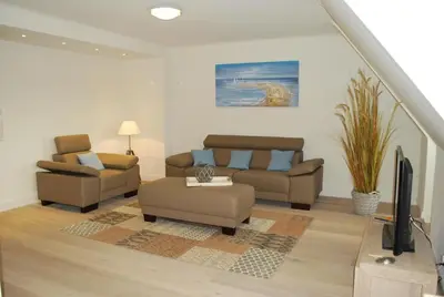 Ein Sitzbereich in der Unterkunft Büsumer Reethus Apartment 3 4