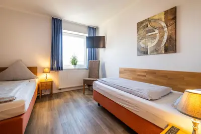 Ein Bett oder Betten in einem Zimmer der Unterkunft Haus Ankerplatz Apartment 3 1
