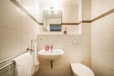 Ein Badezimmer in der Unterkunft Haus Seehafen Apartment 0 2