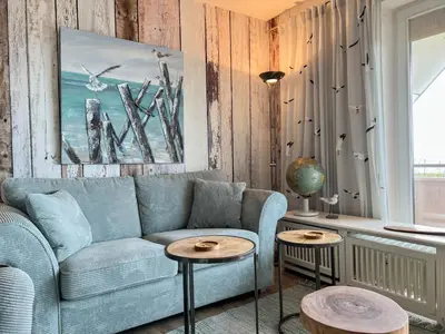 Ein Sitzbereich in der Unterkunft Haus Nordseeblick Wohnung 47 Möövnest 1