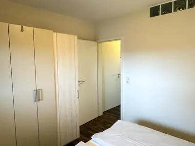 Ein Bett oder Betten in einem Zimmer der Unterkunft Haus Nordseeblick Wohnung 48
