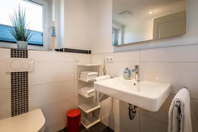 Ein Badezimmer in der Unterkunft Haus Deichkieker Apartment 4 1