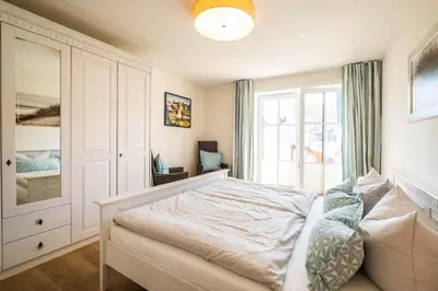 Ein Bett oder Betten in einem Zimmer der Unterkunft Büsumer Reethus Apartment 1 1