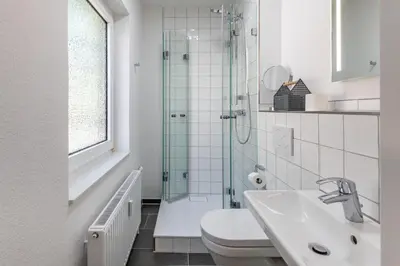 Ein Badezimmer in der Unterkunft Haus Treibholz Apartment 3