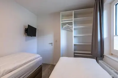 Ein Bett oder Betten in einem Zimmer der Unterkunft Haus Treibholz Apartment 6