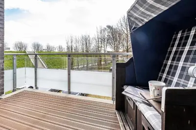 Ein Balkon oder eine Terrasse in der Unterkunft Haus Deichoase Apartment 1 4