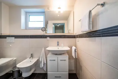 Ein Badezimmer in der Unterkunft Haus Deichoase Apartment 1 5