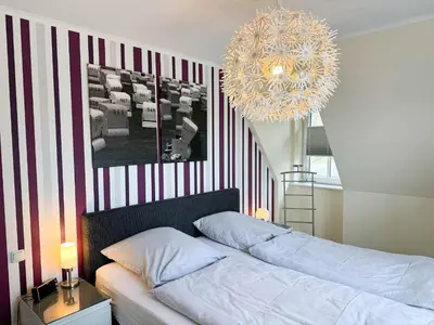 Ein Bett oder Betten in einem Zimmer der Unterkunft Büsumer Reethus Apartment 2 4