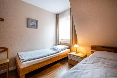 Ein Bett oder Betten in einem Zimmer der Unterkunft Haus Kähler 1 Wohnung 4