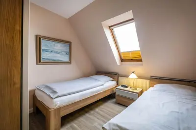 Ein Bett oder Betten in einem Zimmer der Unterkunft Haus Kähler 1 Wohnung 7