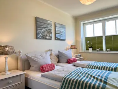 Ein Bett oder Betten in einem Zimmer der Unterkunft Büsumer Reethus Apartment 2 6