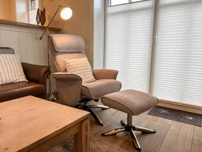 Ein Sitzbereich in der Unterkunft Büsumer Reethus Apartment 2 6