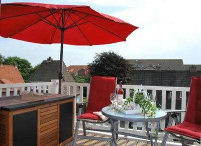 Ein Balkon oder eine Terrasse in der Unterkunft Büsumer Reethus Apartment 3 1 Dünengras