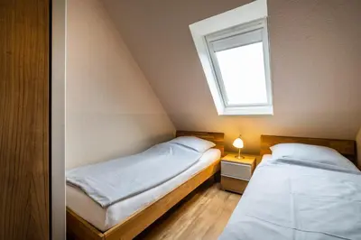 Ein Bett oder Betten in einem Zimmer der Unterkunft Haus Kähler 2 Wohnung 12