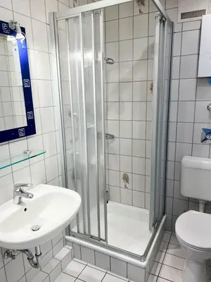 Ein Badezimmer in der Unterkunft Haus Nordseeblick Wohnung 22