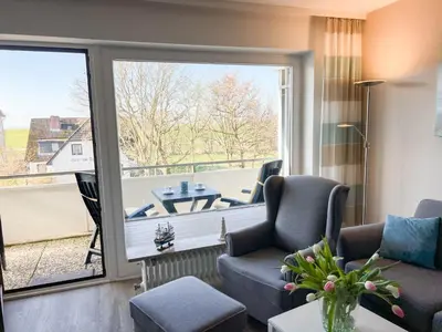 Ein Sitzbereich in der Unterkunft Haus Nordseeblick Wohnung 22