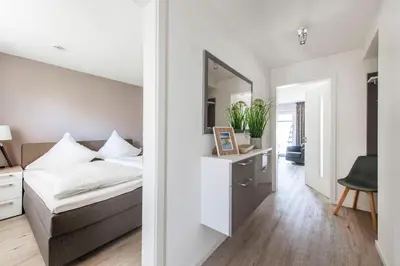Ein Bett oder Betten in einem Zimmer der Unterkunft Haus Deichkieker Apartment 2 3 Deichkrone