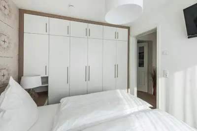 Ein Bett oder Betten in einem Zimmer der Unterkunft Haus Deichkieker Apartment 3 2 Tide