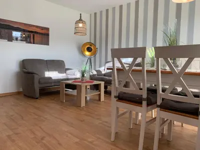 Ein Sitzbereich in der Unterkunft Kleine Brise Apartment 1