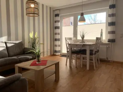 Ein Sitzbereich in der Unterkunft Kleine Brise Apartment 1