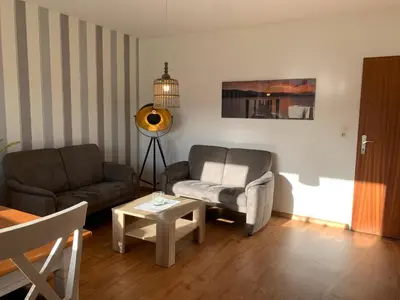 Ein Sitzbereich in der Unterkunft Kleine Brise Apartment 3