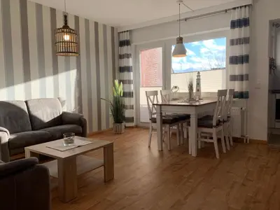 Ein Sitzbereich in der Unterkunft Kleine Brise Apartment 4