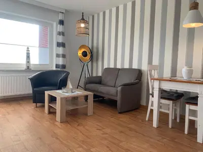 Ein Sitzbereich in der Unterkunft Kleine Brise Apartment 5