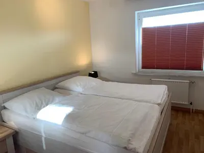Ein Bett oder Betten in einem Zimmer der Unterkunft Kleine Brise Apartment 5