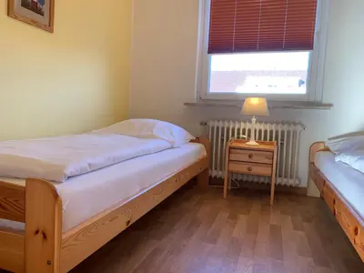 Ein Bett oder Betten in einem Zimmer der Unterkunft Kleine Brise Apartment 6