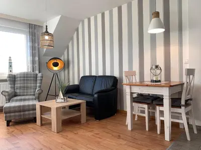 Ein Sitzbereich in der Unterkunft Kleine Brise Apartment 8