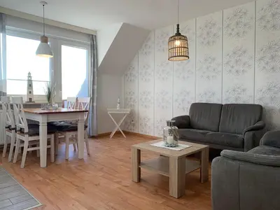 Ein Sitzbereich in der Unterkunft Kleine Brise Apartment 9