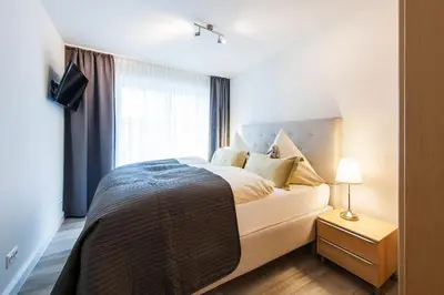 Ein Bett oder Betten in einem Zimmer der Unterkunft Büsumer Reethus Apartment 1 2
