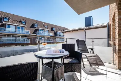 Ein Balkon oder eine Terrasse in der Unterkunft Haus Hummerklippe Apartment 4