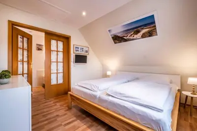Ein Bett oder Betten in einem Zimmer der Unterkunft Haus Seemeile Seemeile 2 15