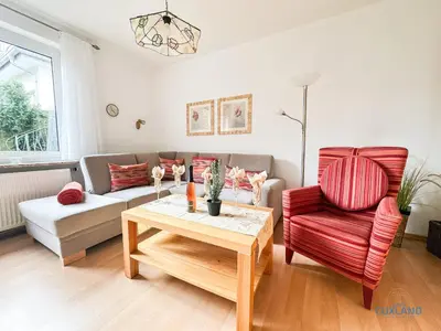 Ein Sitzbereich in der Unterkunft Ferienwohnung Seerose