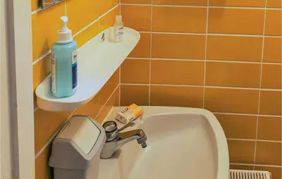 Ein Badezimmer in der Unterkunft Cozy Home In Wingst With Sauna