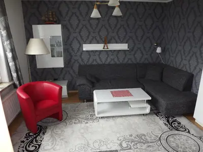 Ein Sitzbereich in der Unterkunft Strandstraße 51a FeWo Kaptäns Suite