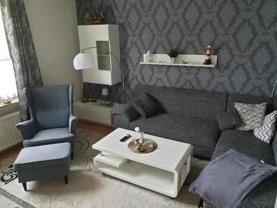 Ein Sitzbereich in der Unterkunft Strandstraße 51a FeWo Kaptäns Suite