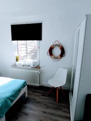 Ein Bett oder Betten in einem Zimmer der Unterkunft Geesthaus