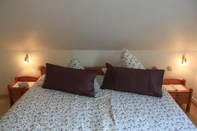Ein Bett oder Betten in einem Zimmer der Unterkunft Ferienhof Schoof No2