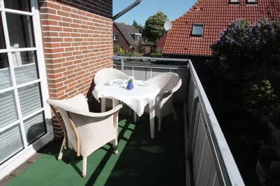 Ein Balkon oder eine Terrasse in der Unterkunft Haus Westerstraße Westerstr 16 Wohnung 1