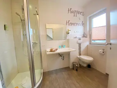 Ein Badezimmer in der Unterkunft Haus Övern Diek Wohnung 1 a