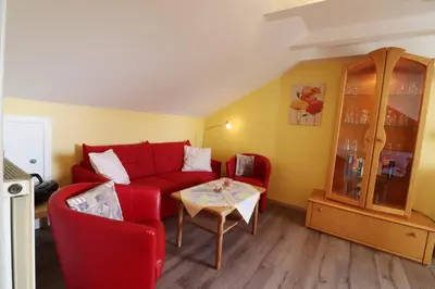 Ein Sitzbereich in der Unterkunft Haus am Kurpark Wohnung 26