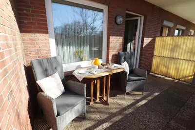 Ein Sitzbereich in der Unterkunft Haus am Kurpark Wohnung 1