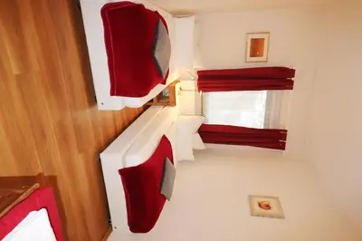 Ein Bett oder Betten in einem Zimmer der Unterkunft Haus am Kurpark Wohnung 2